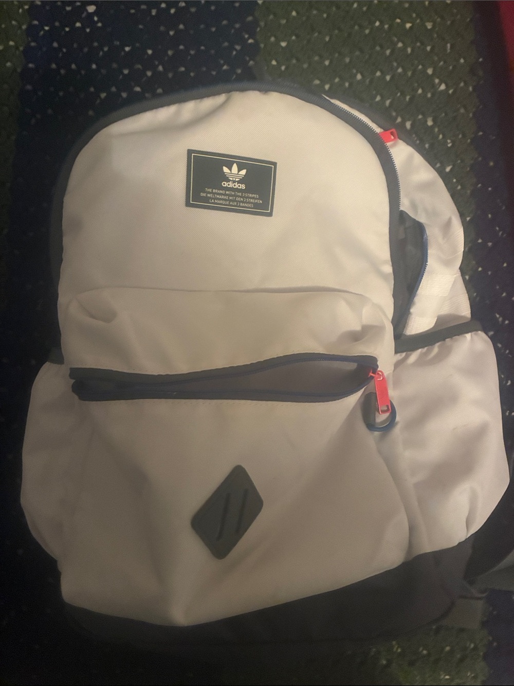 adidas White Backpack with Black Trim and Red Zipper Pulls